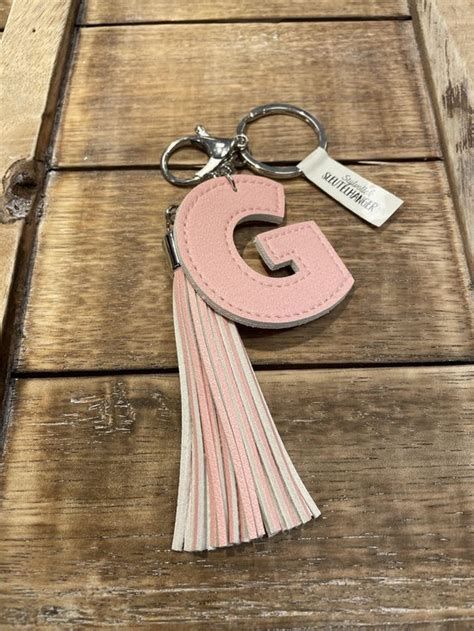 Sleutelhanger Met Kwastje Imitatie Leer Roze G Bol