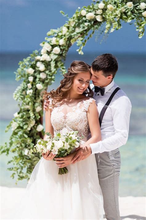 Stunning beach wedding | Wedding dresses lace, Wedding, Beach wedding