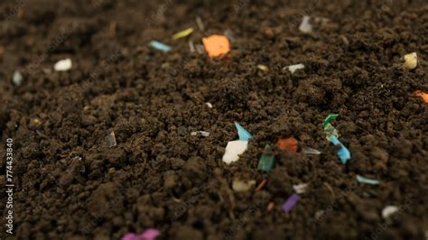 Microplastics inside the soil. Concept of plastic pollution ...