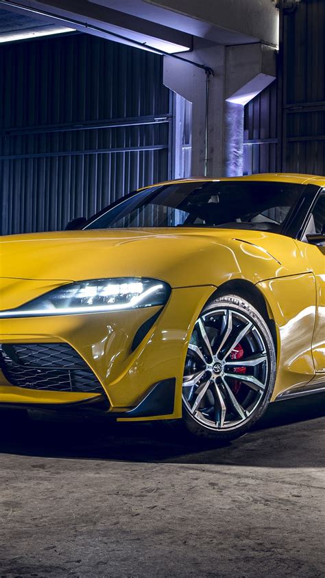 Yellow 2020 Toyota Supra Sports Car in Industrial Ambiance - backiee