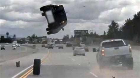 Car Sent Flying Into The Air After Being Hit By A Tire CAUGHT ON CAM