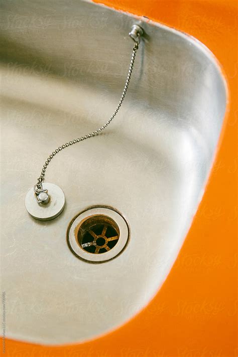 "Kitchen Sink Drain With Chain Stopper" by Stocksy Contributor "Raymond ...