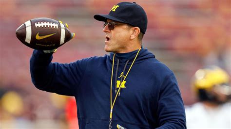 WATCH: Michigan coach Jim Harbaugh joins player celebration after ...