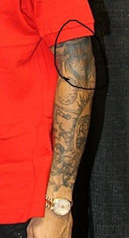 Chris Brown Tattoos Girlfriend Karrueche Tran's Face On His Arm