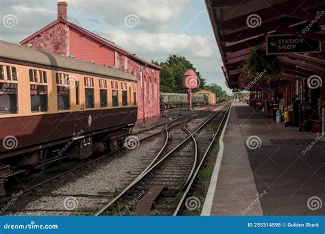 Restored Victorian Era Passenger Rail Train At A Train Station Stock