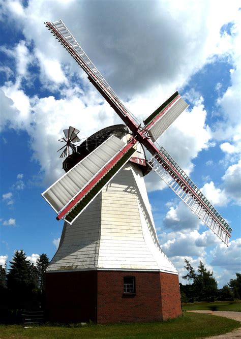 Free Images Wing Sky Wind Building Machine Blue Clouds Mill