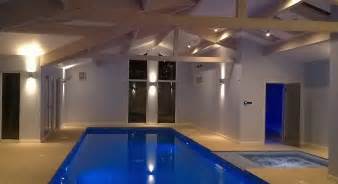 A bespoke residential indoor pool with spa, sauna and steam room