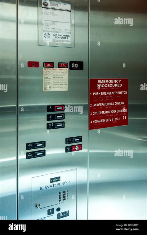 Kone stainless steel elevator control panel Stock Photo - Alamy