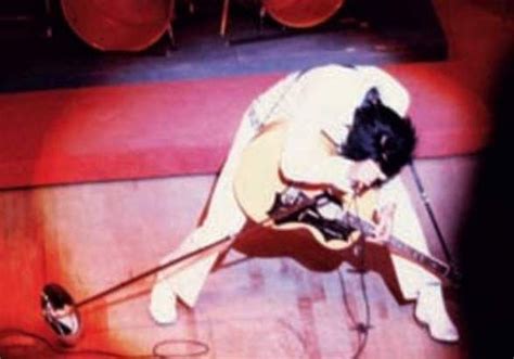 Elvis Performing At The Las Vegas International Wearing White