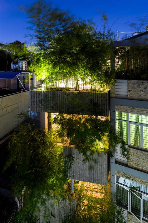 Vo Trong Nghia Fronts Skinny House With Huge Bamboo Filled Planters