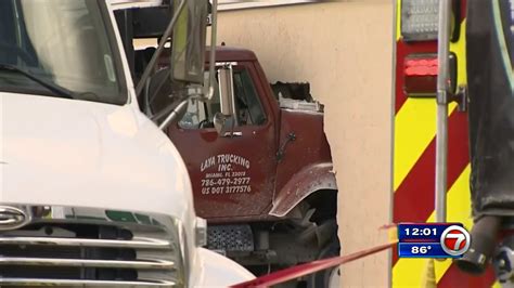 2 Transported After Dump Truck Crashes Into Sw Miami Dade Business