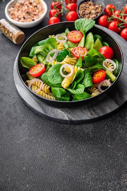 Premium Photo Pasta Green Salad Fusilli Tomato Cucumber Green Leaf