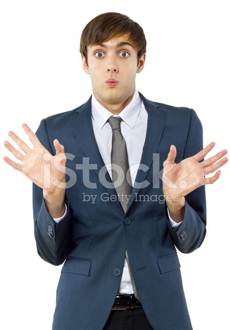 Mocking Gesture By A Caucasian Businessman On A White Background Stock