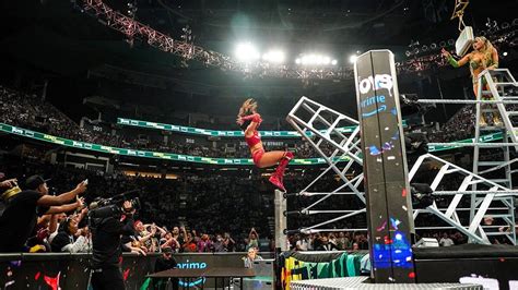 Tiffany Stratton Pushes Chelsea Green Onto Tables Off The Ladder At Wwe