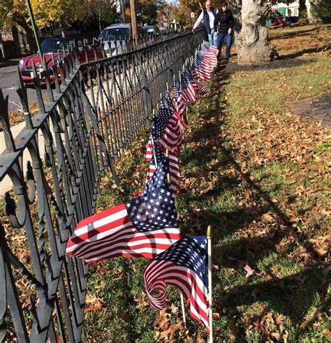 Flags Placed In Churchyard In Honor Of Veterans