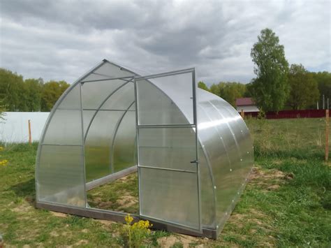 Теплица из поликарбоната "Триумф-Капля" с доставкой и установкой.