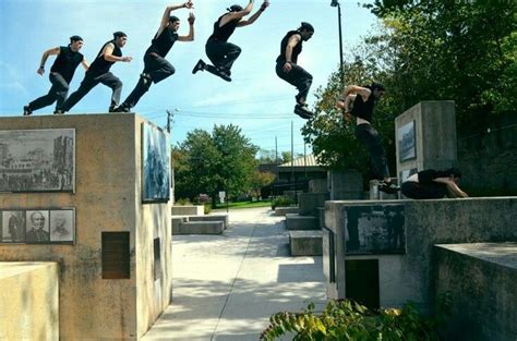 the man is doing tricks on his skateboard in the air over cement blocks ...