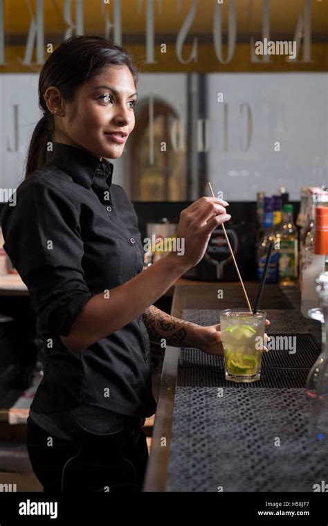 Female bartender dress hi-res stock photography and images - Alamy