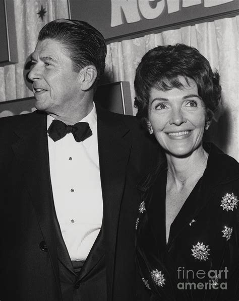 Ronald And Nancy Reagan Smiling by Bettmann