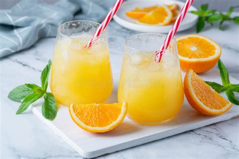 Glass of Orange Juice with Ice. Cold Orange Fresh Stock Image - Image ...