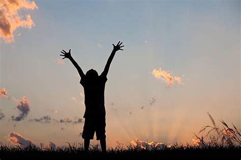 Silhouette Of Kids Praising God Stock Photos Pictures And Royalty Free