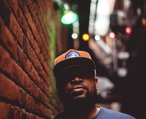 Premium Photo Portrait Of Man Wearing Cap Against Illuminated City At