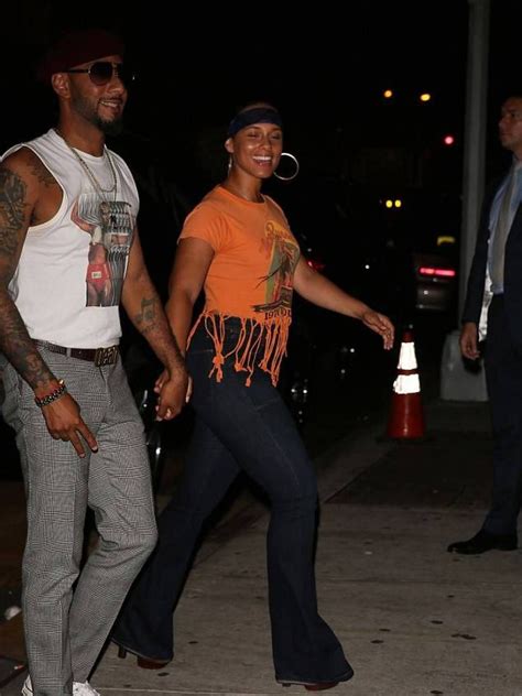 Swizz Beatz And Alicia Keys At Beyoncés 70s Themed Birthday Bash