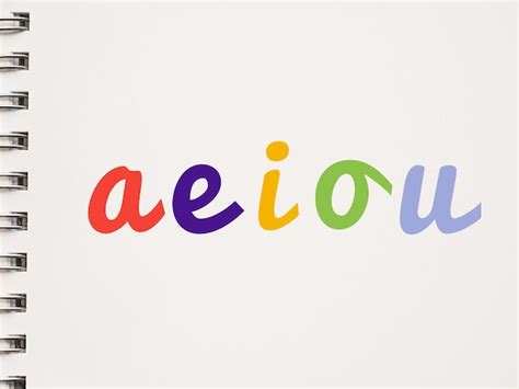 Premium Photo | Colorful handwColorful handwritten AEIOU lowercase vowelsritten AEIOU lowercase ...