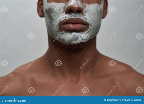 Face Closeup Of Shirtless Young African American Man Using Facial Blackhead Removal Mask Posing