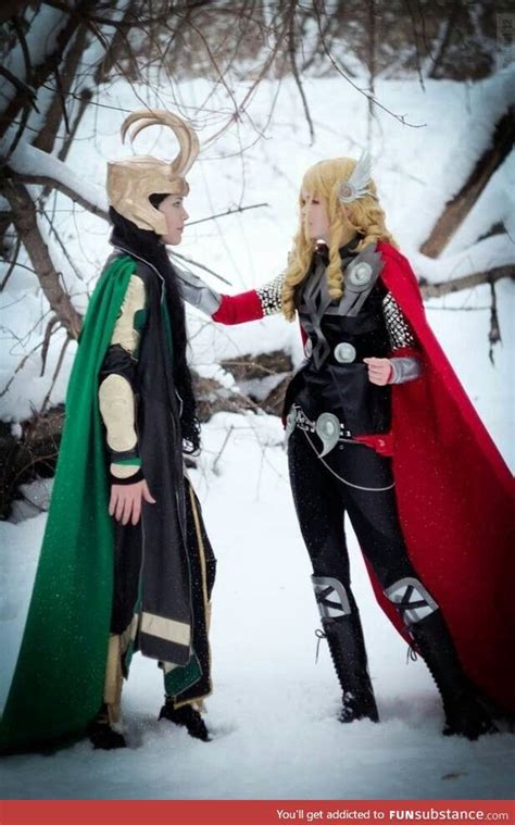 Two People Dressed As Thor And Loki In The Snow