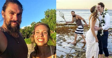 Two People Are Standing On The Beach And One Is Holding Flowers In Her Hand While The Other Has