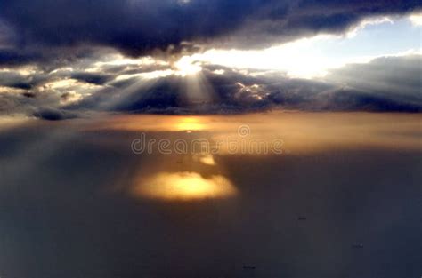 Sun Rays through the Clouds Stock Photo - Image of ocean, ligth: 98023730