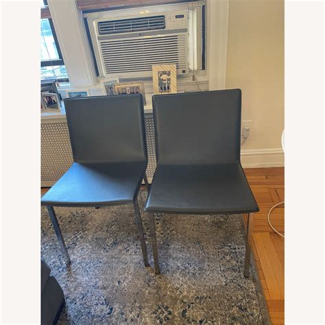 Cb2 2 Dining Chairs Aptdeco