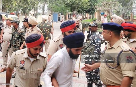 Associates Of Waris Punjab De Chief Amritpal Singh Being Presented In News Photo Getty Images