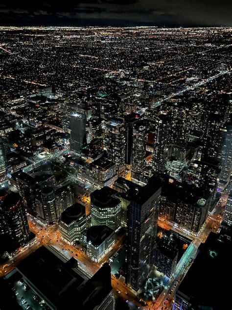 Aerial View of City Buildings during Night Time · Free Stock Photo