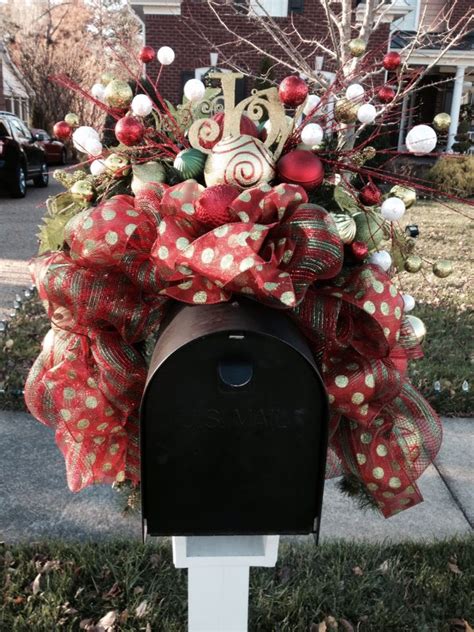 Deco Mesh Mailbox Swag Attached To A Floral Foam Saddle Greenery And