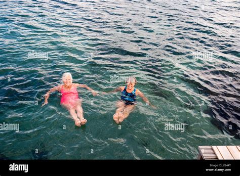 Senior Women Swimming In Water Stock Photo Alamy