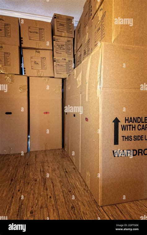 Moving Boxes In A Residential House Stock Photo Alamy