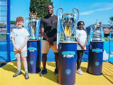 City treble trophies visit PlayZones - Manchester Football