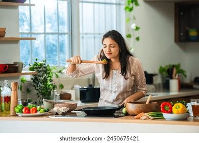 Indian Asian Young Woman Enjoy Cooking Stock Photo 2450675421 ...