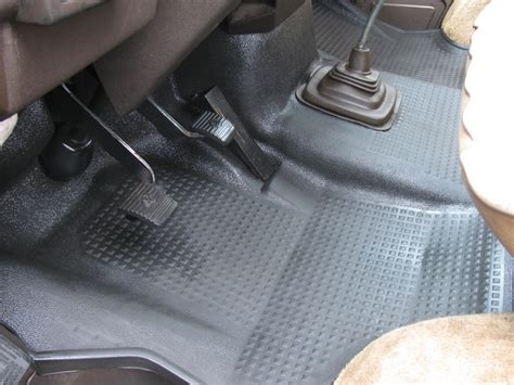 The Interior Of A Car With No One In It Or Someone Sitting On The Floor