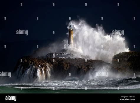 The Mouro Island Lighthouse During A Storm Big Waves More Of