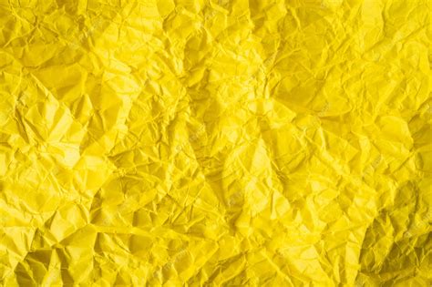 Premium Photo Yellow Crumpled Paper Background