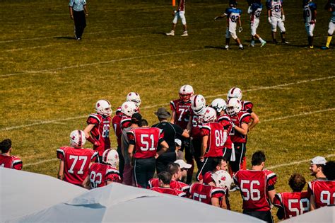 Football Team Wearing Red Jersey · Free Stock Photo