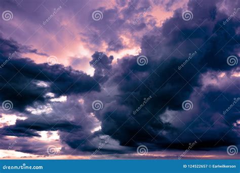 Gorgeous Sunset through Dramatic Storm Clouds. Stock Image - Image of ...