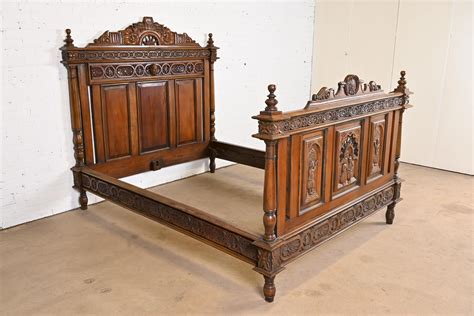 Antique Renaissance Revival Ornate Carved Mahogany Queen Size Bed At