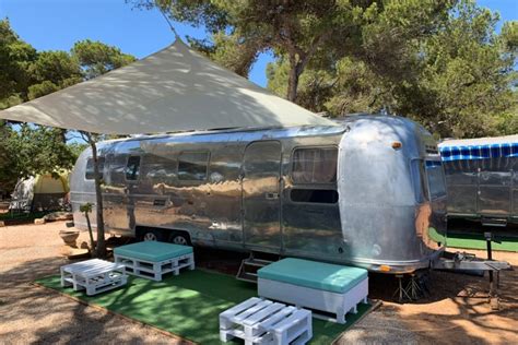 Iconic Trailers On The Beach At Camping La Playa Cala Martina Ibiza