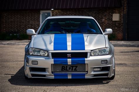 Front Of Silver R34 Nissan Skyline GT R With Blue Stripes BenLevy