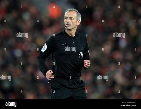 Referee Martin Atkinson During The Premier League Match At Anfield