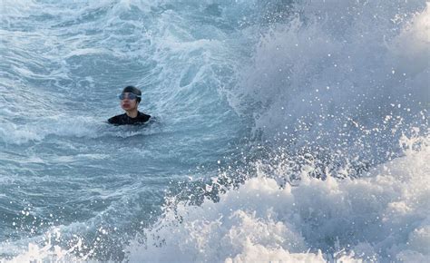 Dramatic Sea Rescue As Swimmer Saved By Lifeguards Seconds Before She